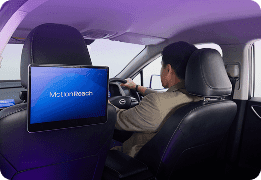 Passenger view of a MotionReach digital screen in a Bangkok taxi