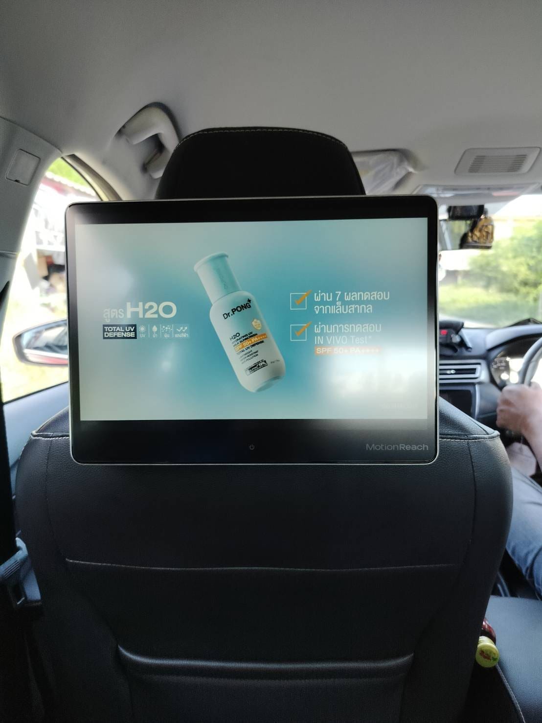 Dr.Pong presenter creative on a MotionReach taxi screen