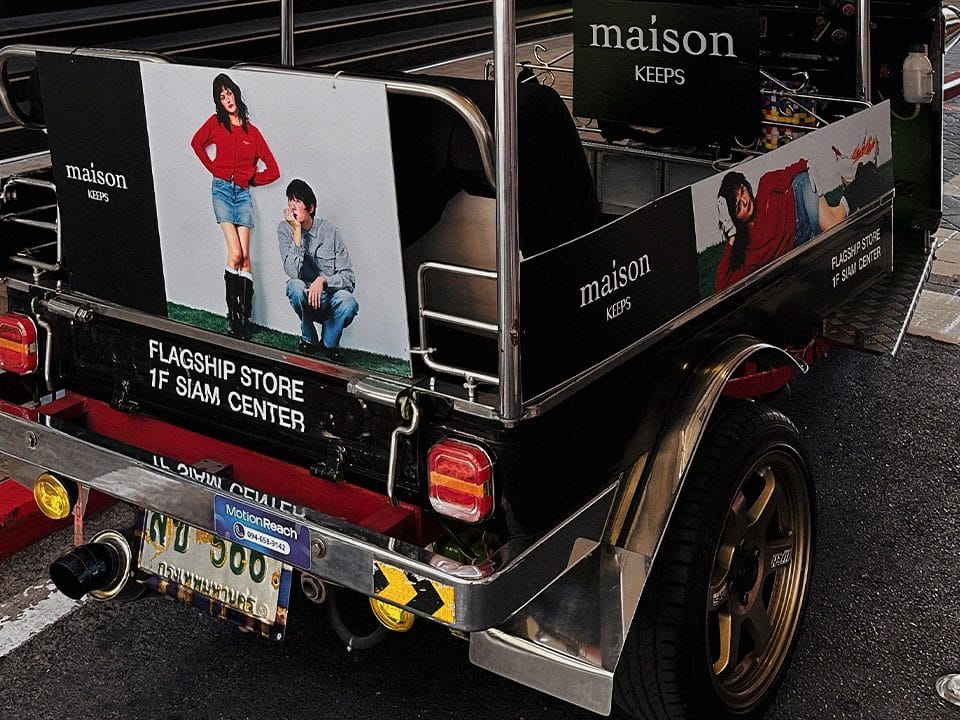 Tuk-tuk rear panel with Maison Keeps campaign photography and the line Flagship Store 1F Siam Center