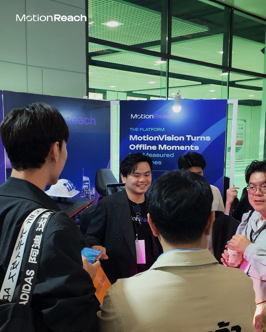 Visitors talking with the MotionReach team at the booth during MKTCON 2026
