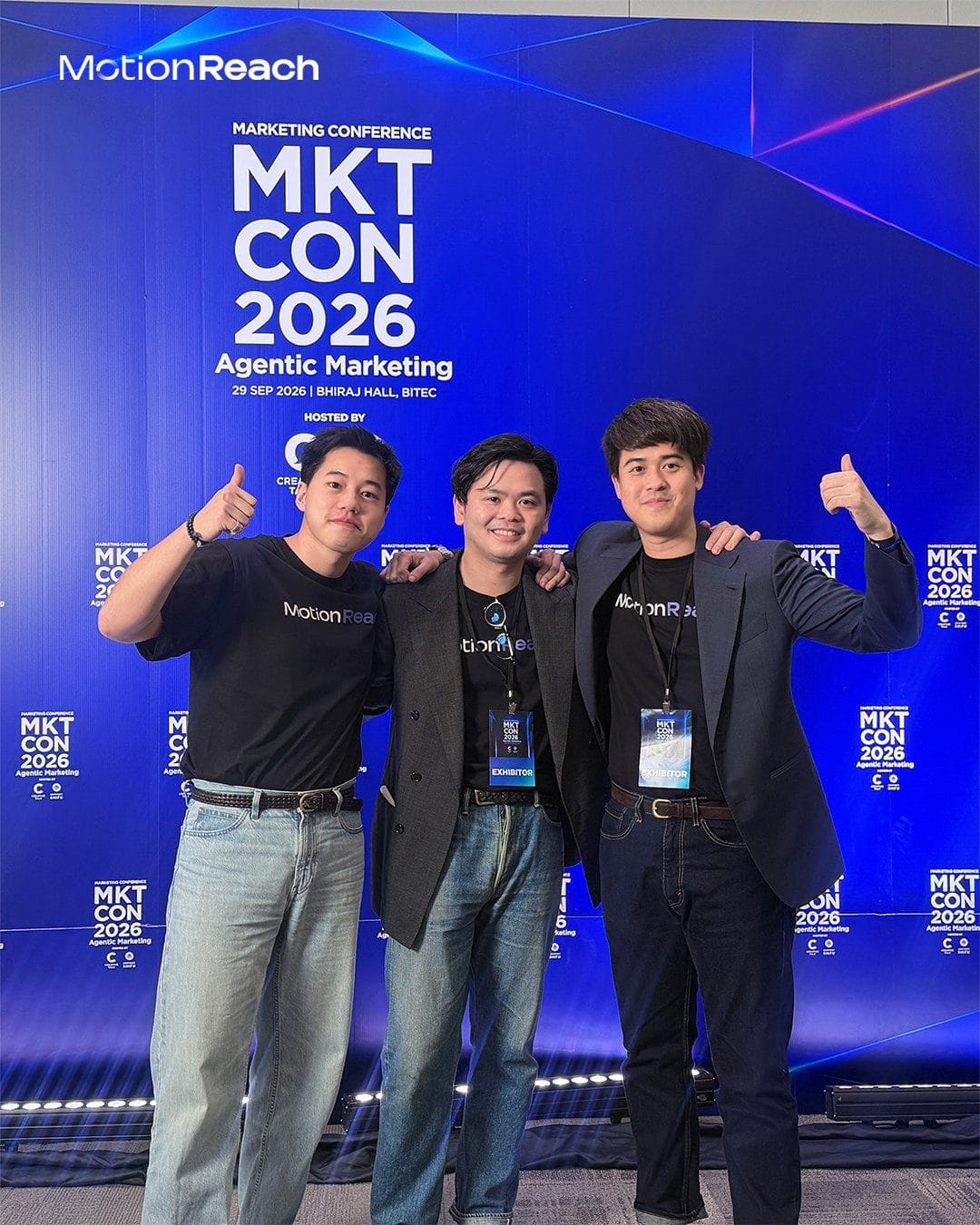 MotionReach team members in front of the MKTCON 2026 backdrop