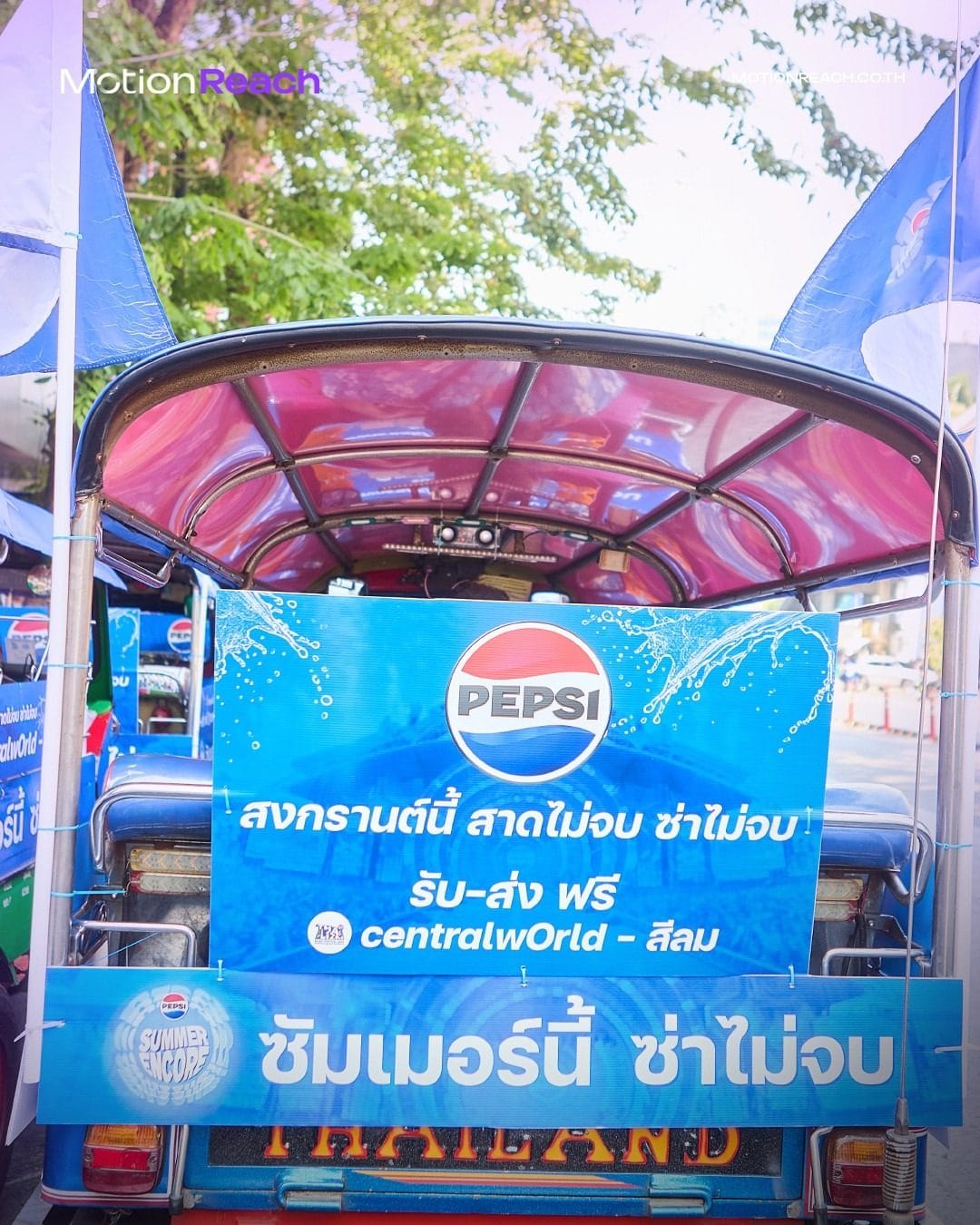 Rear panel of a Pepsi tuk-tuk offering free rides between centralWorld and Silom